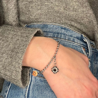 Bracciale con charm genesa in acciaio inossidabile